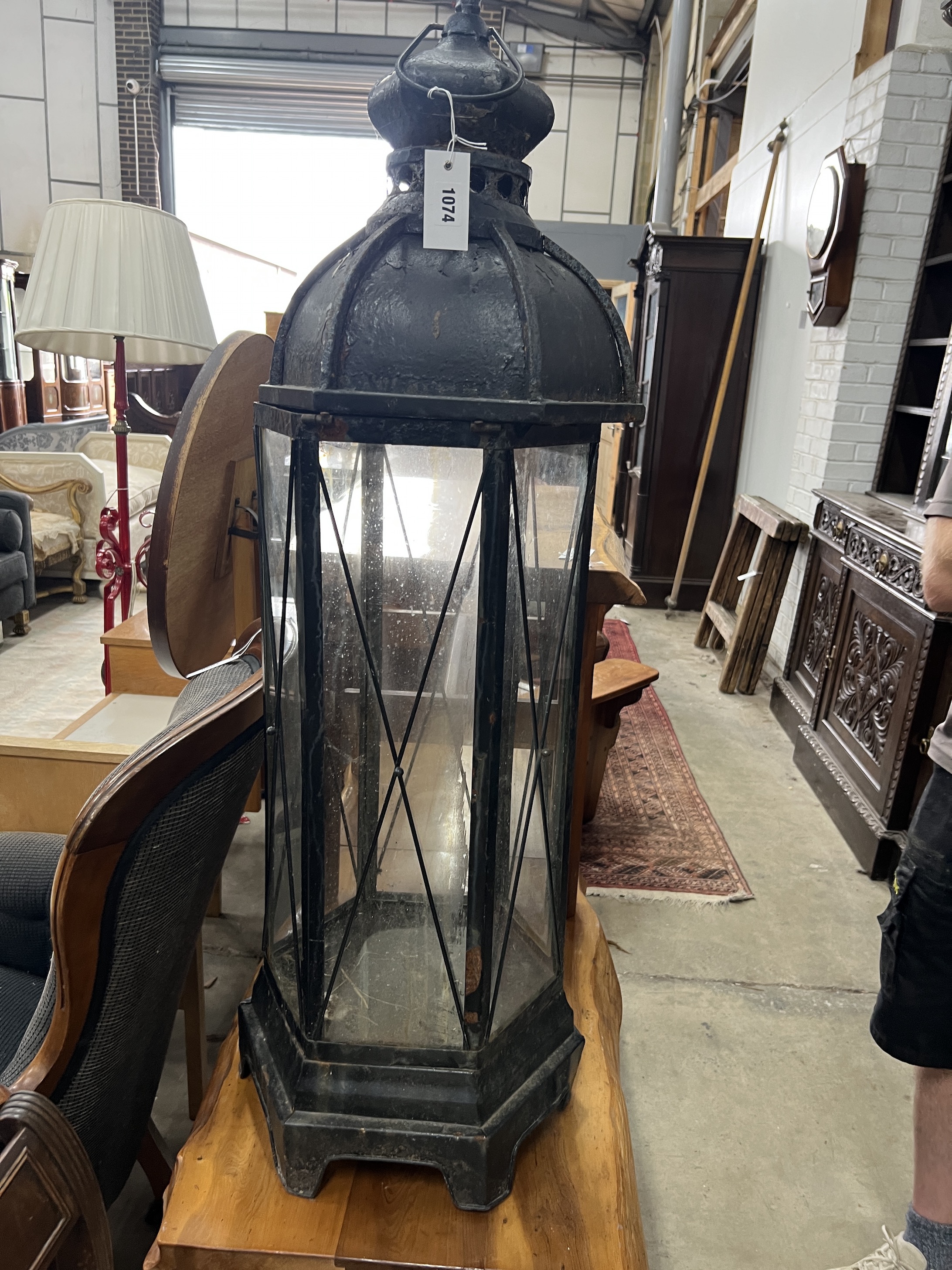A painted hexagonal metal garden lantern, height 112cm